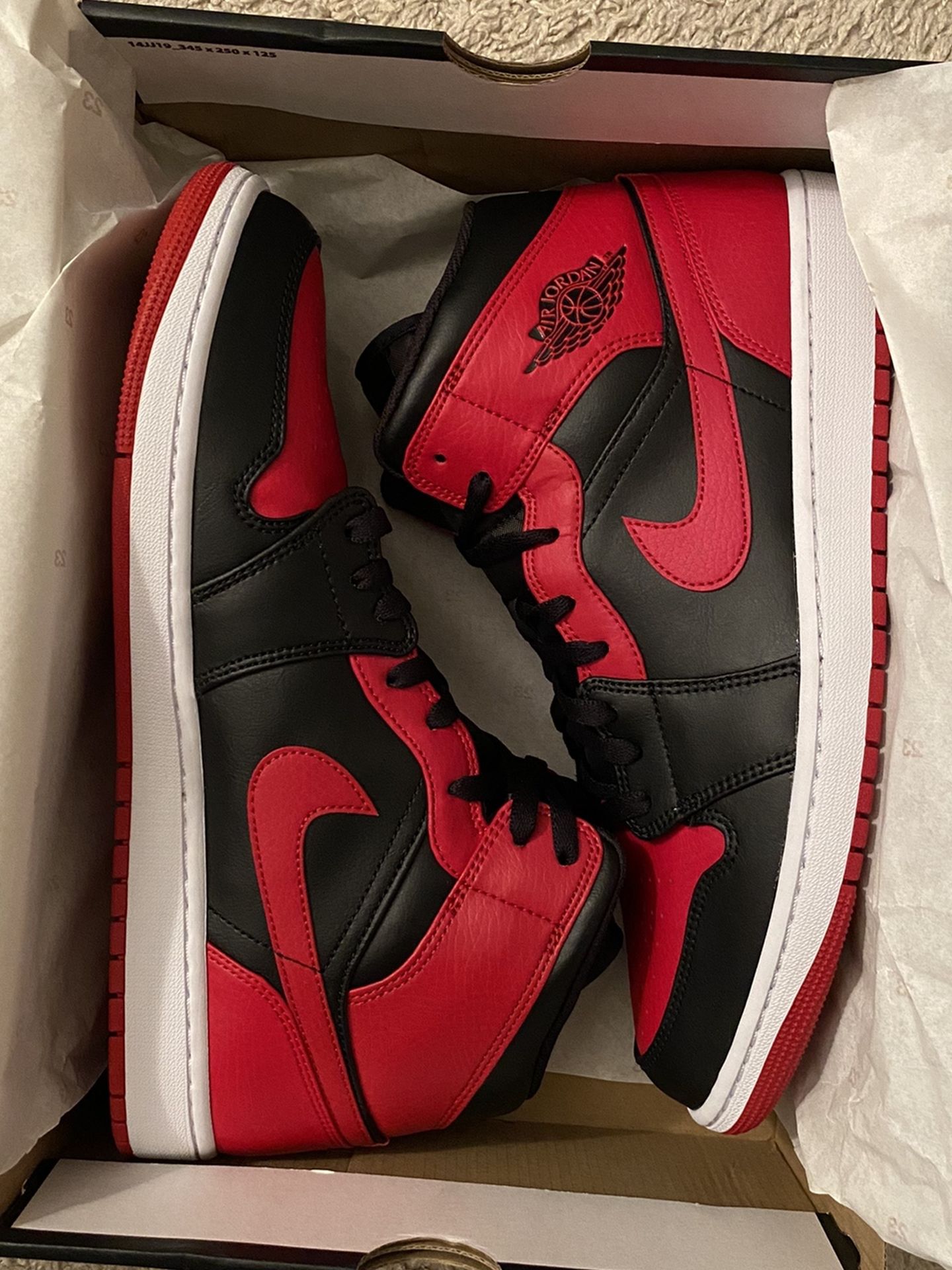 Jordan 1 Mid “Banned”