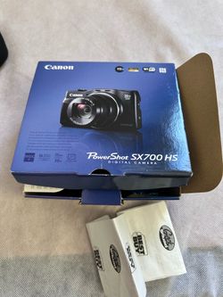 Canon PowerShot SX700 HS digital camera with case and charger excellent like new condition. In storage all this time-Never been used. Pick up and cash