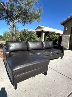 Free Delivery Leather Sectional in Good Condition
