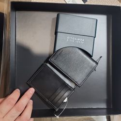 Brand New Perry Ellis Portfolio Wallet
Description: Brand new, never used Perry Ellis Portfolio wallet. Comes in the original box. Sleek black leather