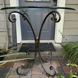 30” Diameter Iron Base with Glass Top. 29” Tall