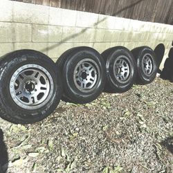 Set Of 4 ( PRO COMP) Wheels Gun Metal And 4 Tires 