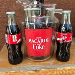 Enjoy Bacardi And Coke Glass Pitcher And Six Small FIFA Cokes From México. 