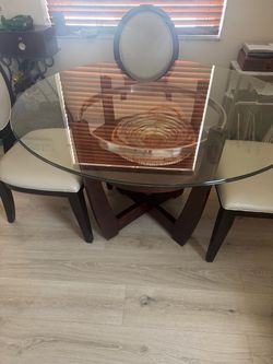 Round glass top dining table