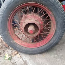 Have 2 Rims And Tires Off Old Ford 