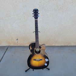 GREAT DIVIDE brand acoustic guitar .  Comes with stand and guitar case. Im asking  $170. 00 for everything