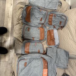 8 Piece Set Compression Backpack - Gray. Brand New 