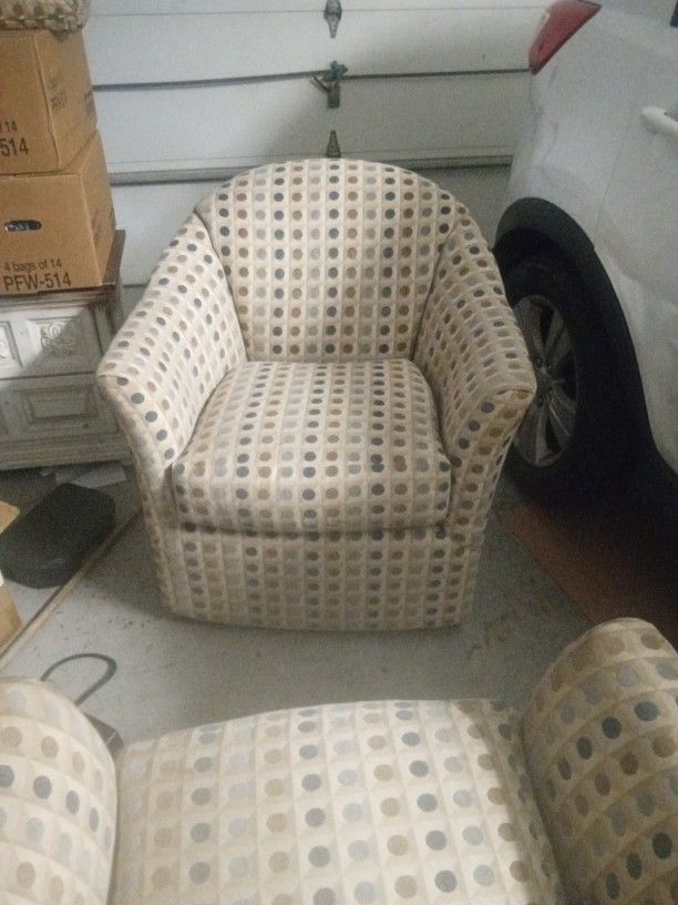 Two Swivel Chairs