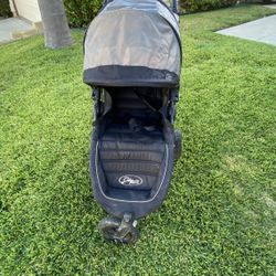 Baby Jogger City Mini GT2 All-Terrain Stroller Black Complete with Adjustable Handlebar Hand-Operated Parking Brake and car seat Adapter