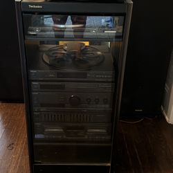 Techniques stereo shelf, audio, glass door cabinet, tape deck, amplifier turntable