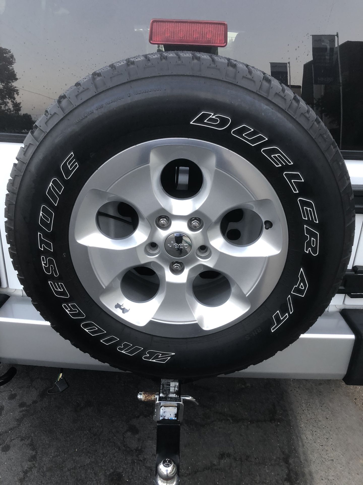 2016 Jeep Wrangler OEM Tires and Rims - Not the Jeep itself.