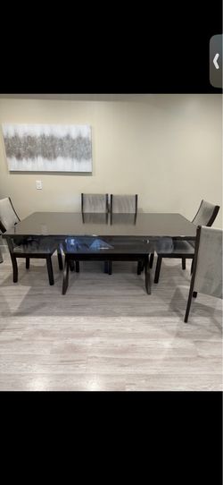 Dinning table with 6 chairs  $300