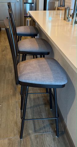 Three bar stools used but great conditions