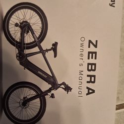 Zebra Electric Bike ( New) 58 Miles Only 1year Old