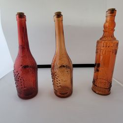 Three Decorative Bottles.