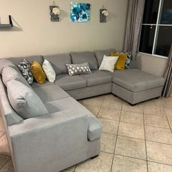 Bonaterra Model Ligth Grey Sectional Couch From Living Spaces 