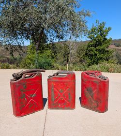 Set of 3 vintage Jerry cans with flexible nozzle