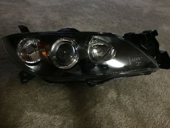 Mazda 3 head light (03-09)