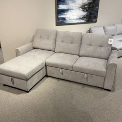 Sectional With Pull Out Bed And Storage 