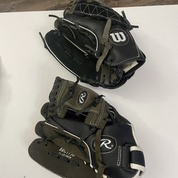 two right handed baseball gloves 