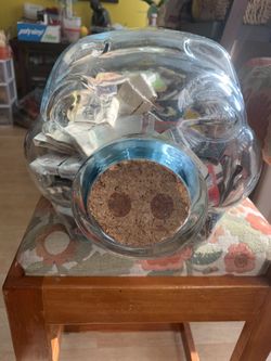 Glass Piggie with collection of matches from around the world