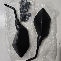 Rear view mirrors with brackets