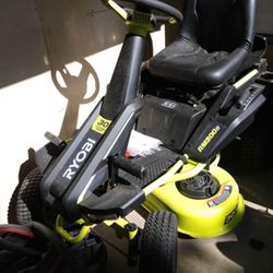 $1200 Paid $2900 after tx / asking 1/2 - Ryobi Ride On Lawn Mower w/bag and extra blade