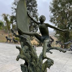 Life Size bronze Boy Surfing
