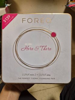 Brand New! FOREO "Here & There" LUNA mini 2 + LUNA play Gift Set, which is a special edition skincare package containing two sonic silicone facial cl
