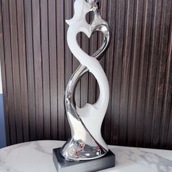 Chrome white couple sculpture