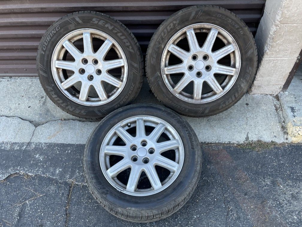 Three PT Cruiser 16 inch wheels and good tires 5 on 100mm $80 each