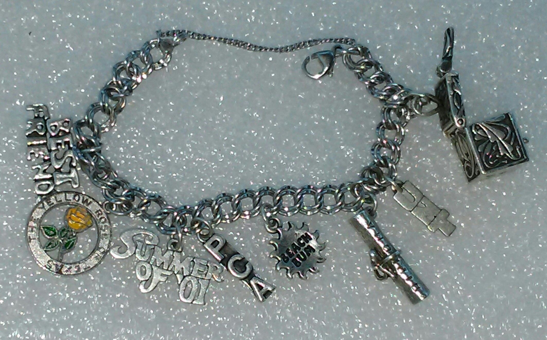 JAMES AVERY CHARM BRACELET 8" STERLING SILVER CHARMS ( will sell individual charms)
