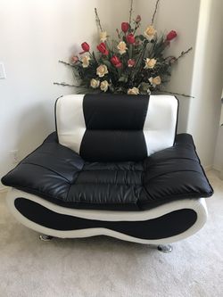 Black and White single leather couch
