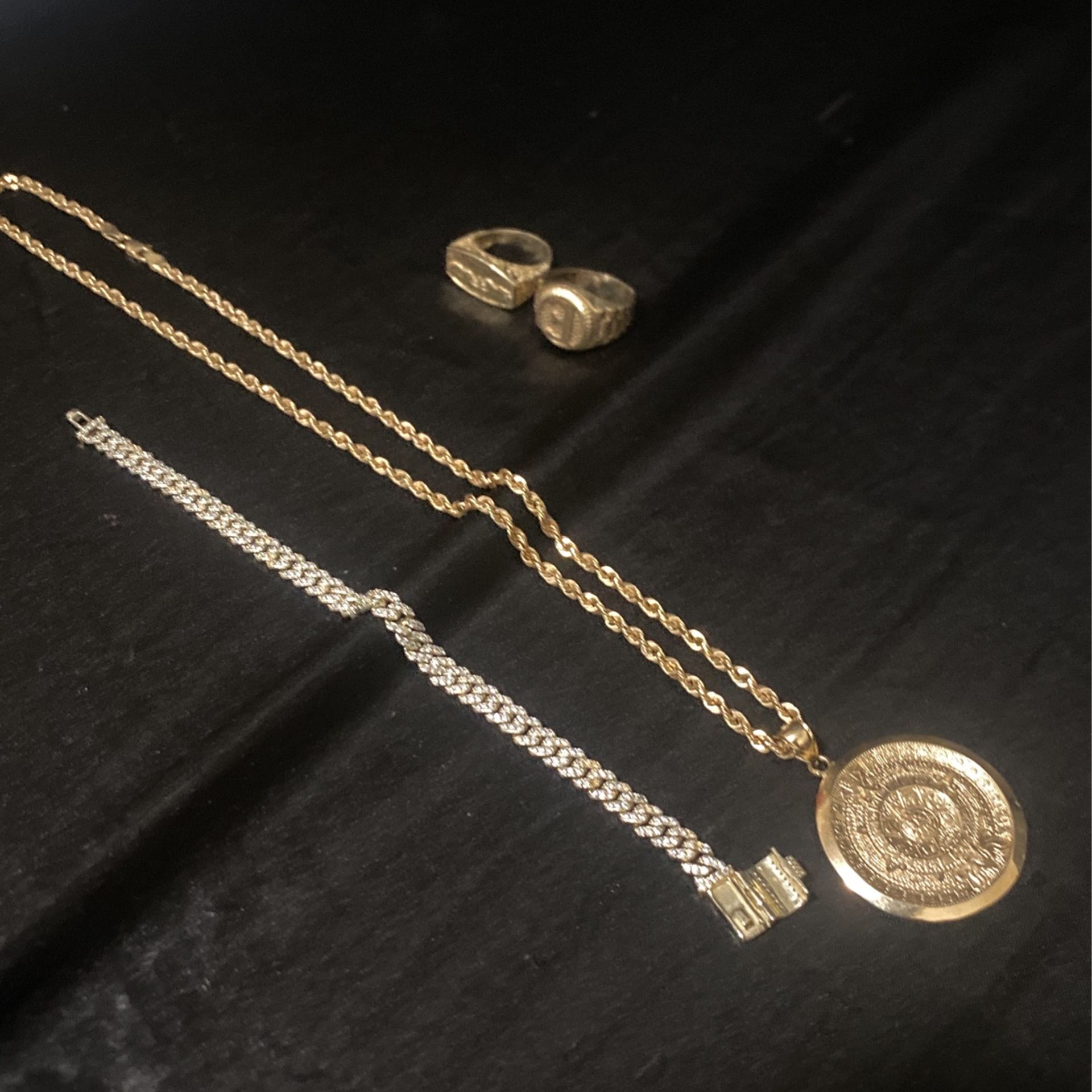 Gold Necklace Rings And Pendant