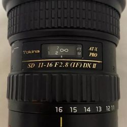Tokina AT-X 116 PRO DX-II 11-16mm f/ 2.8 Lens for Canon Mount w/ Lens Covers.