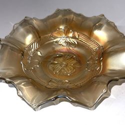  Dugan carnival glass bowl features a beautiful apple blossom pattern in marigold color with iridescent peach tones. 
