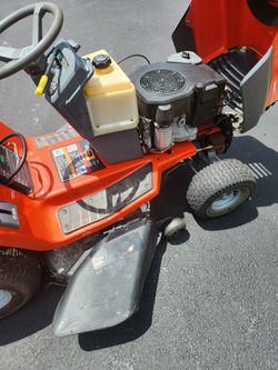 Scotts, riding mower. Made by John Deere