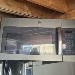 Brand New General Electric Stove Top Microwave Oven