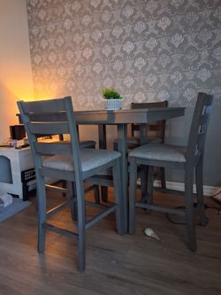 Gray wood dining table w/ chairs