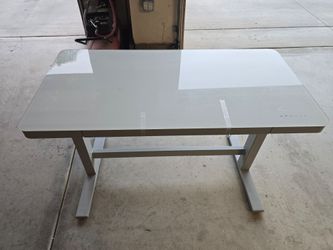 TWO TRESANTI ELECTRIC ADJUSTABLE STANDING DESKS