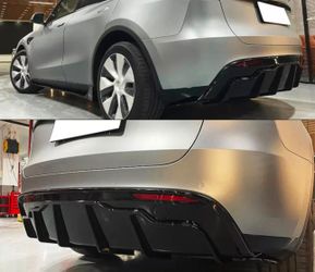 Carbon Fiber Rear Diffuser V1 - 20-24 Tesla Model Y New in Box

Difusor trasero de fibra de carbono V1 - Tesla Model Y 2020-2024 (nuevo en caja)