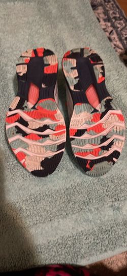 Running Sneakers with Worn Outsoles