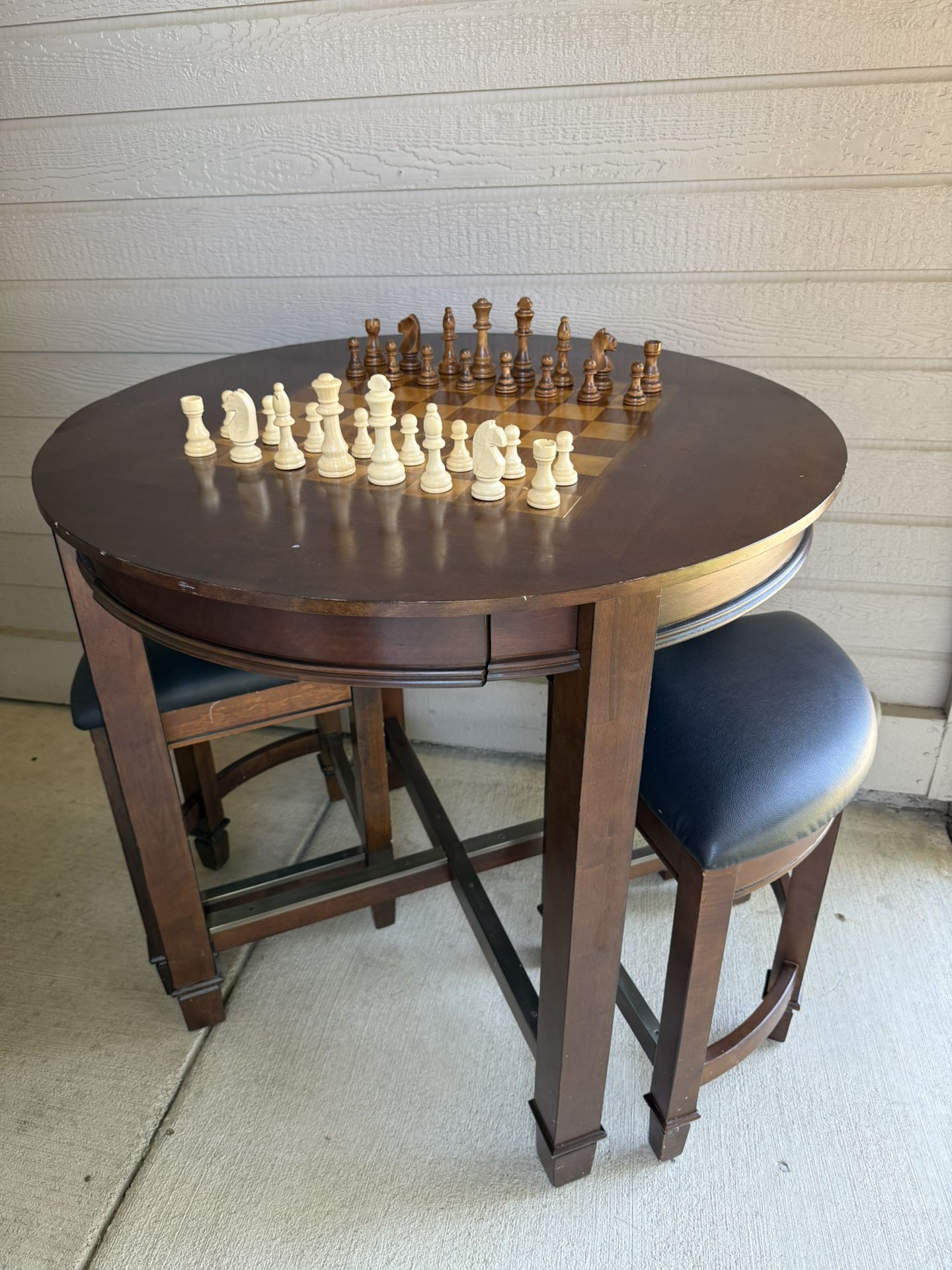 Chess & Checkers Game Top Table & 2 Chairs 36”H x 36”W x 36”T Some nicks in table and slight raised edge in small area Price is firm, pick up in Rockl