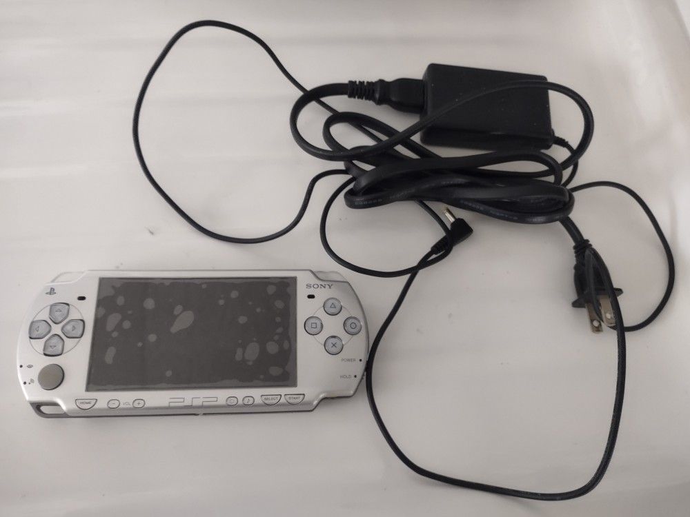 PSP With New Battery , Original Cord , 33 Games , 9 Movies