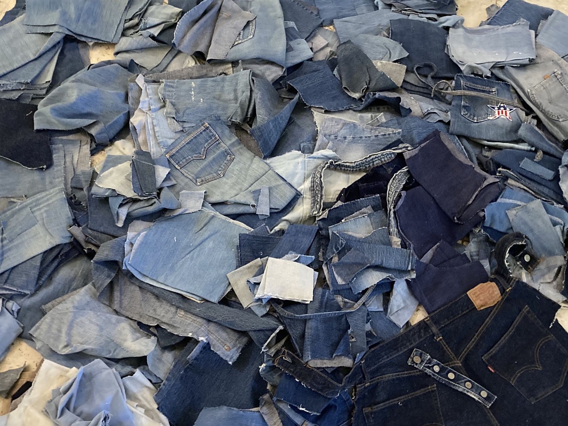 Vintage lot of cut up Levi’s and other brands Blue Jeans scraps material for quilting