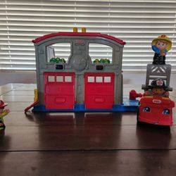 Vintage Fisher-Price Little People Fire Station playset with Firetruck and 3 Firemen