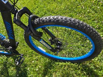 Genesis 26-inch blue mountain bike—in good condition, lightly used.