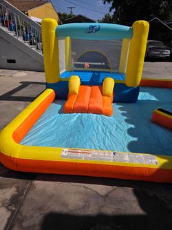Kids inflatable water slide $160