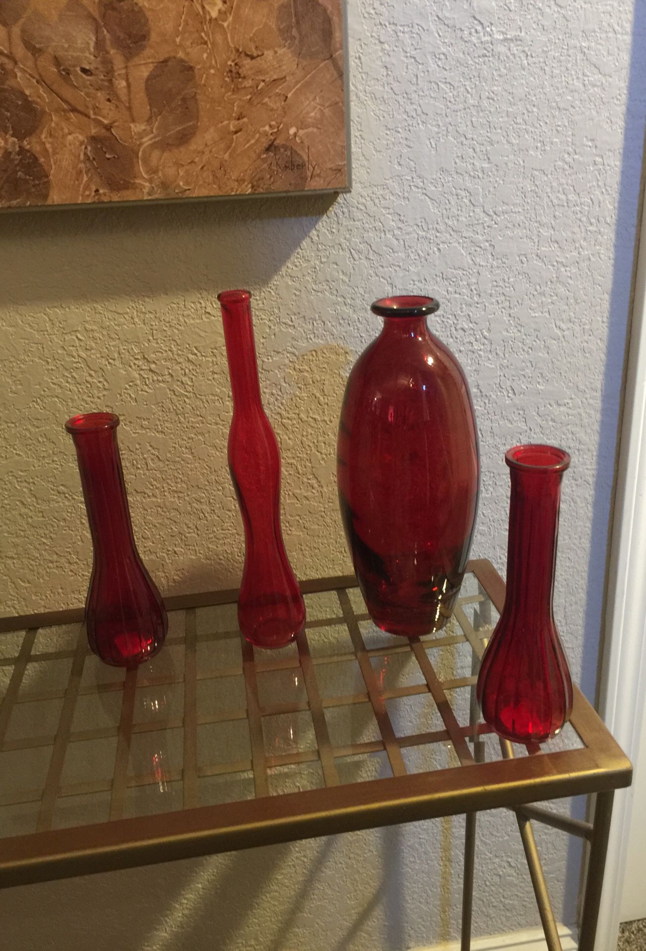Burgundy glass vases new set of four.