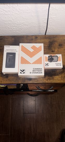 Camera Battery And Charger Ect.